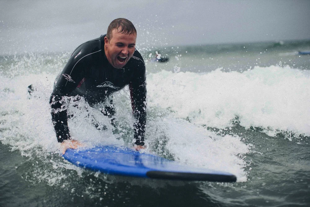 Shane Lowry surfing off the west coast of Ireland