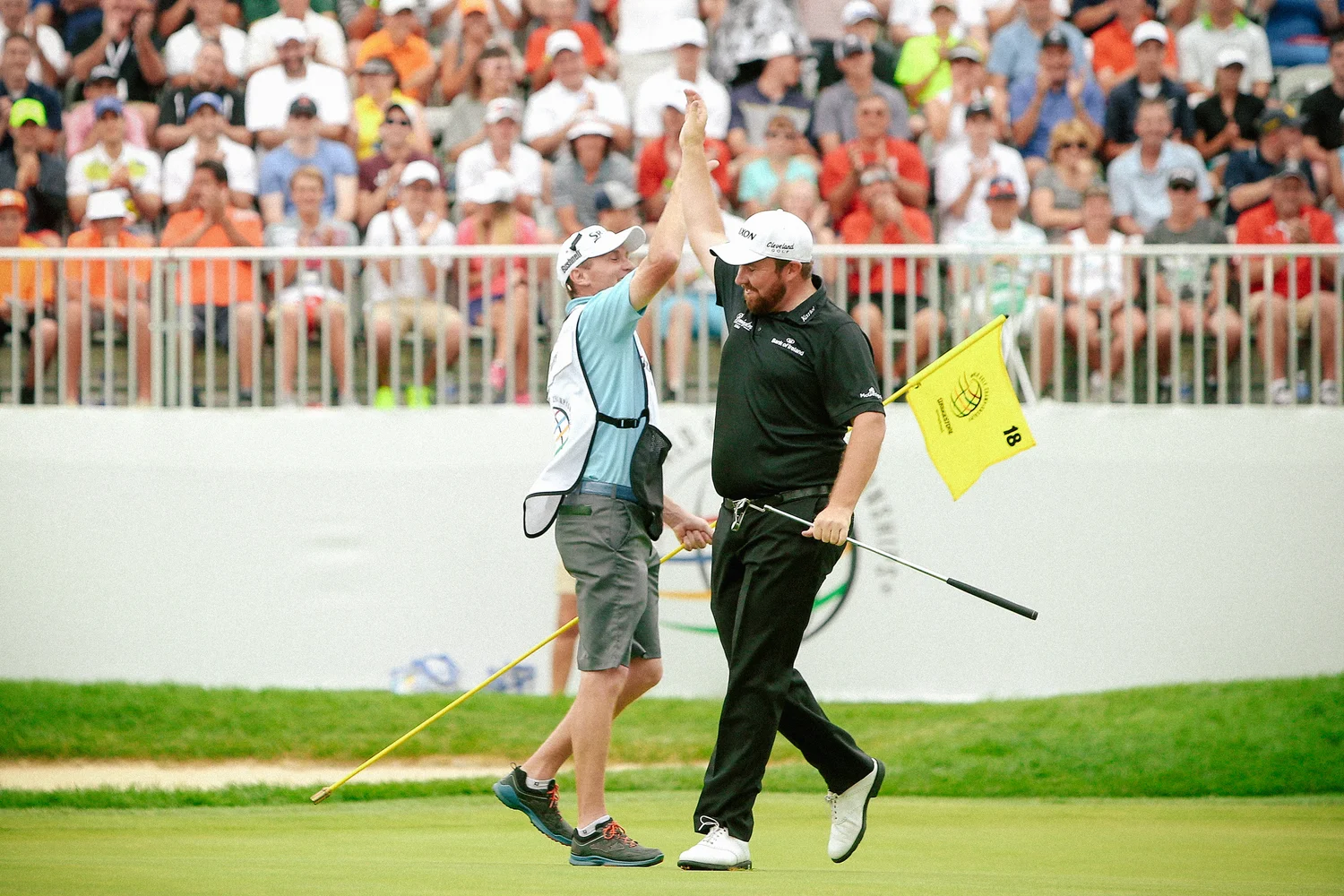 Shane Lowry lifts a trophy