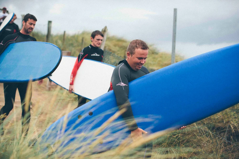 Shane Lowry surfing off the west coast of Ireland